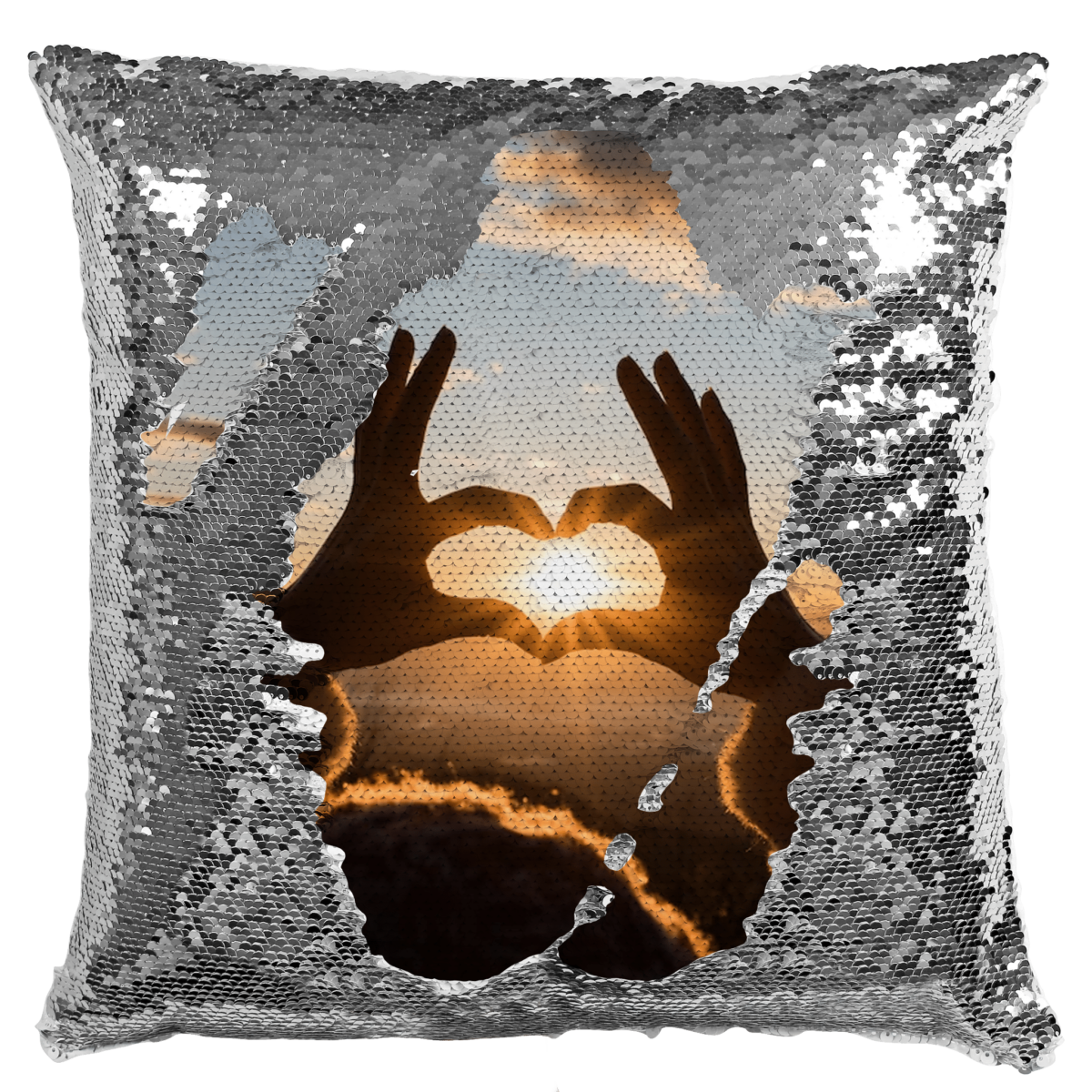 Qstomize.com - Personalize Your Pillow with Custom Reversible Sequin Design Elegant silver sequin cushion showcasing a heart design with a vibrant sunset backdrop.